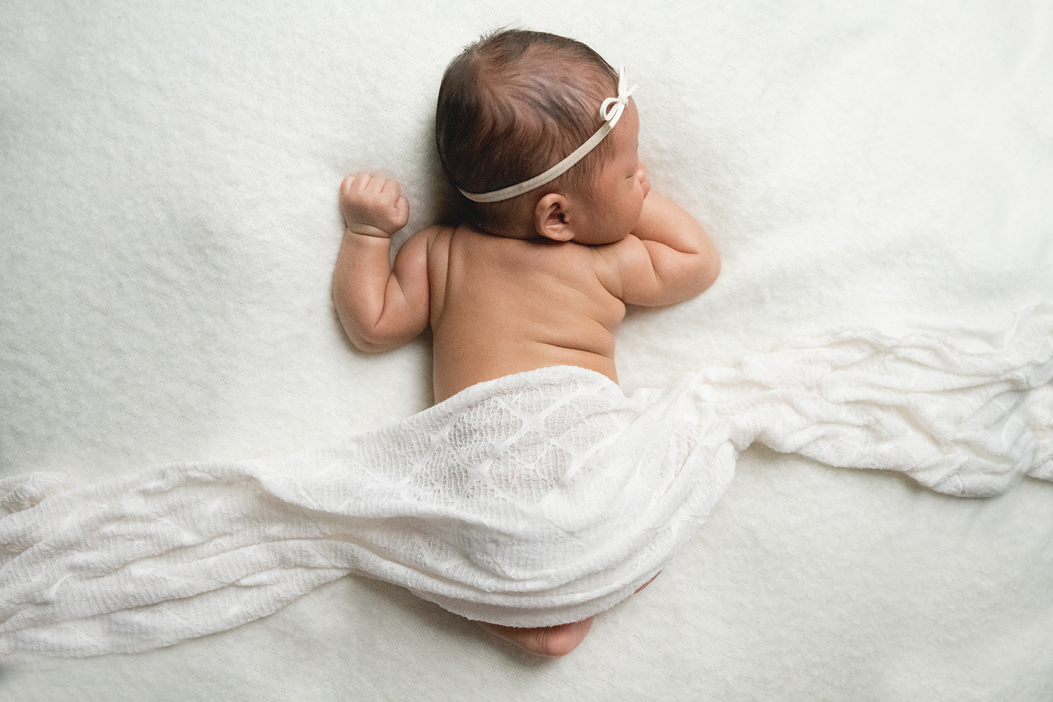 Sweet Baby Rolls on sleepy baby girl in tummy pose; Sandy Springs, newborn fine art portrait session