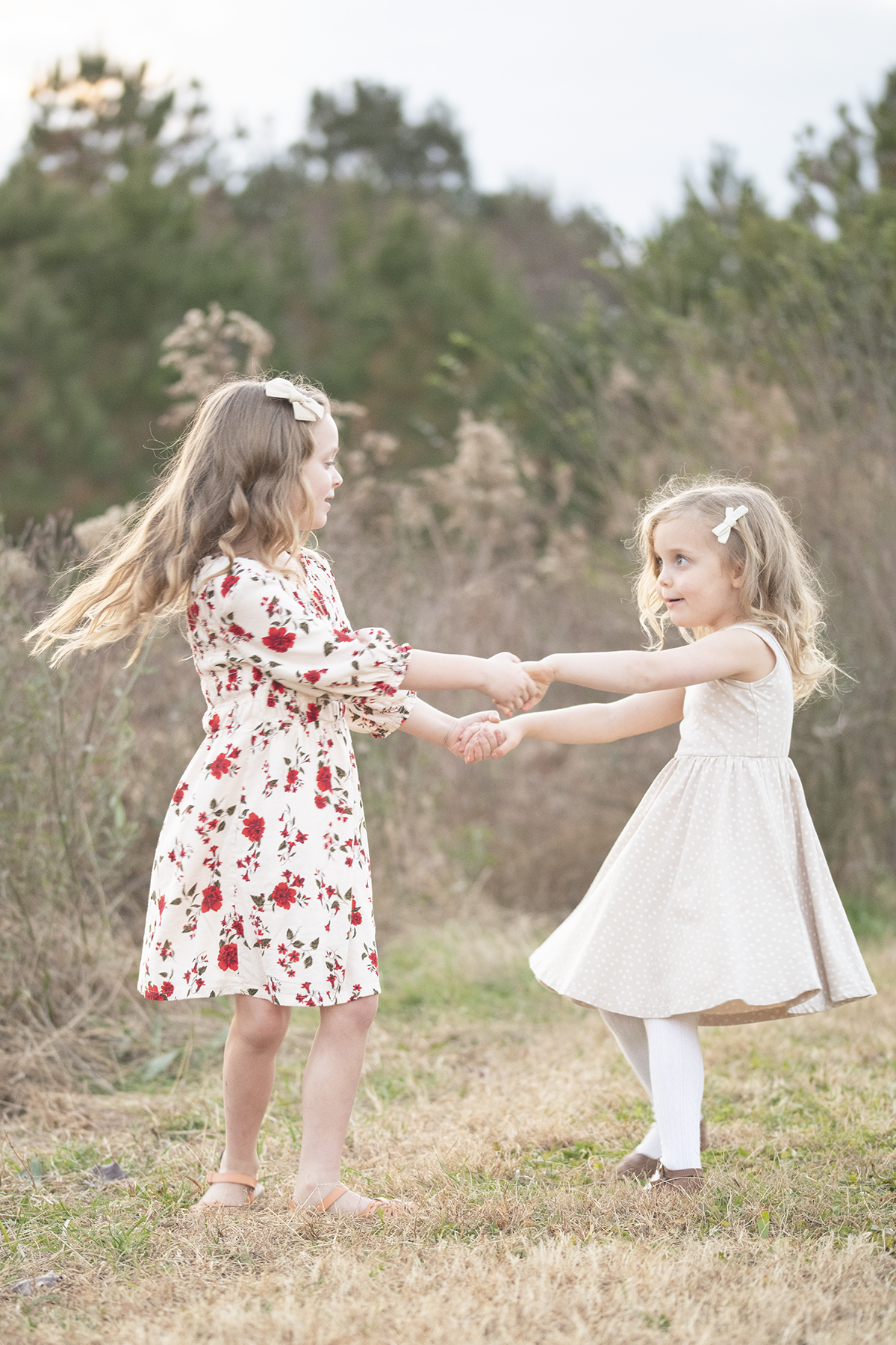 Girls Playing in Park During Fall